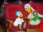 Still from 'She Was An Acrobat's Daughter' featuring the annoying little duck and his father in the cinema