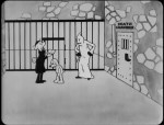 Still from 'Alice's Mysterious Mystery' featuring a dog priest salving an imprisoned dog