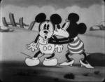 Still from 'Wild Waves' featuring Minnie kissing Mickey